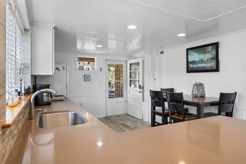 Kitchen & Dining: Bright space with modern appliances and a charming dining setup for meal magic!