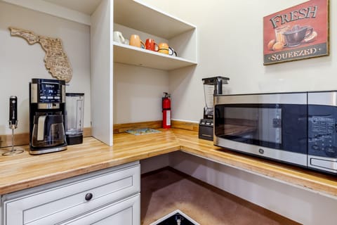 Large Pantry Hold Appliances such as the Microwave and Drip Coffee Maker