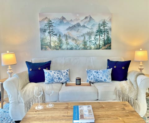 Cozy living room space with down alternative pillows and plush throw blankets