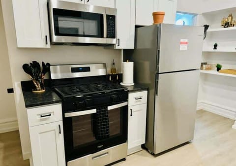 Our Columbus Airbnb kitchen is all about luxury and convenience with modern appliances, elegant countertops, and plenty of space to create your favorite dishes! Enjoy a gourmet experience right at home 