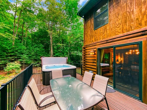 Unwind in the hot tub or enjoy a meal together on the spacious back deck.