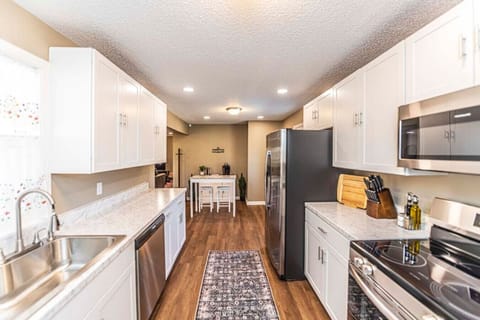 Galley Style Kitchen with Stainless Appliances