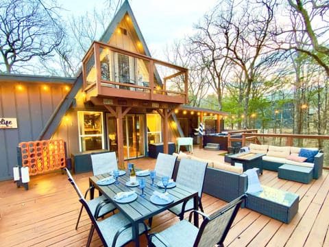 800 sf Deck | Fire table | Outdoor Cooler | Gas Grill (Propane Provided) | Private Hot Tub | Tons of Outdoor Games | Private Wooded Views | String Lights | Outdoor Dining Table for 6