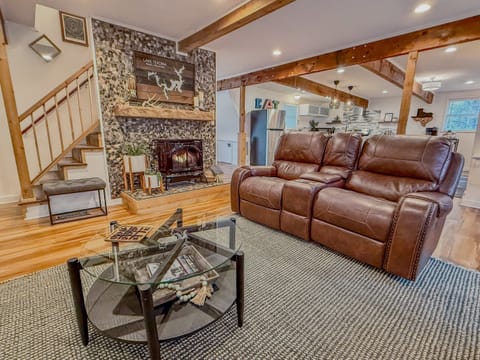 4 Recliners | Foosball Table | 75" Roku TV with Hulu Live TV | Books & Games | *Gas fireplace is no longer functional