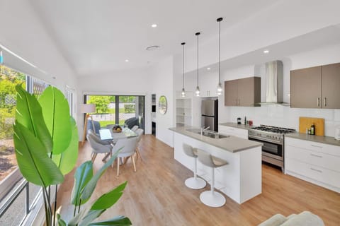 This beautifully styled home comes with a Queensland tropical feel