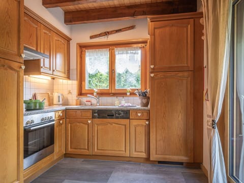 Kitchen, Cabinetry, Flooring, Interior Design, Wood, Furniture, Countertop, Floor, Kitchen Appliance, Cupboard