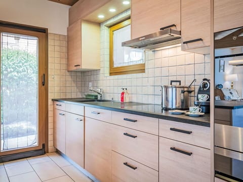 Countertop, Cabinetry, Kitchen, Wood, Kitchen Appliance, Interior Design, Flooring, Plumbing Fixture, Drawer, Sink