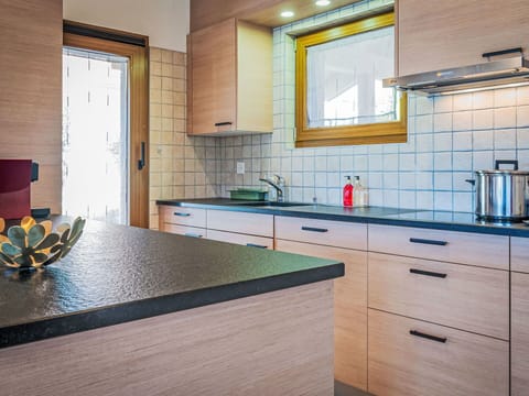 Countertop, Cabinetry, Kitchen, Flooring, Interior Design, Wood, Furniture, Drawer, Floor, Cupboard