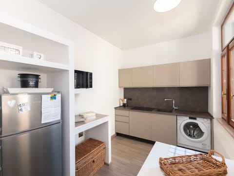 Interior Design, Furniture, Flooring, Floor, Wood, Countertop, Kitchen, Kitchen Appliance, Major Appliance, Ceiling