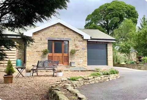 The front elevation and  parking area