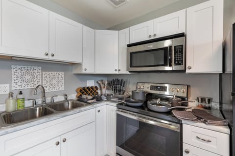 cookware, spices, utensiles, knife set and more provided!