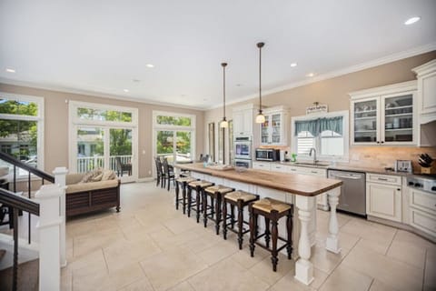 Large butcher block island located in the kitchen on the main level.