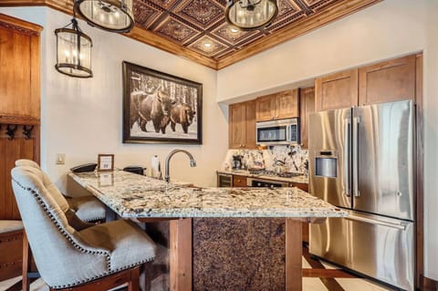 Bright open kitchen with modern appliances.