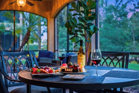 Enjoy magical evenings and serene mornings on a beautifully appointed lanai overlooking lush landscaping.