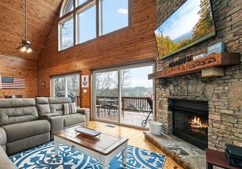 Great room with views, vaulted ceiling and gas fireplace