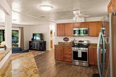 Open-concept kitchen and living space, ideal for socializing.