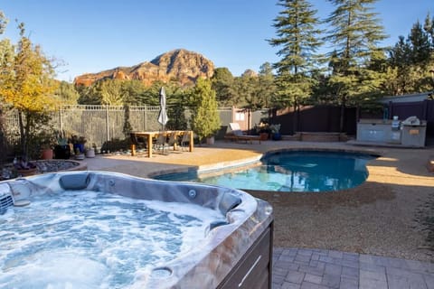 Relax & unwind in a luxurious Jacuzzi hot tub.