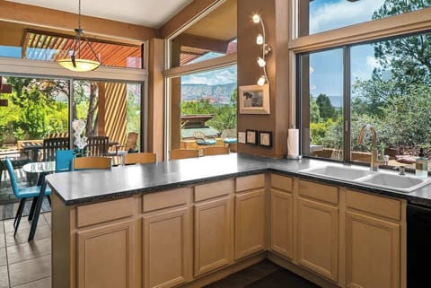 Another kitchen angle showcasing amazing views & ample space.