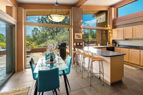 Gather around for dinner in the open kitchen, enjoying breathtaking views.