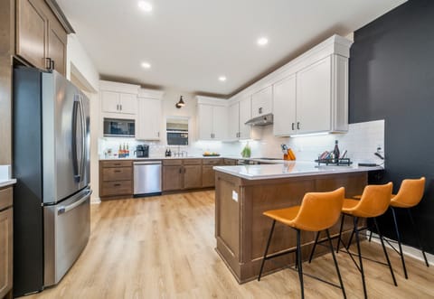 Kitchen Island Provides Additional Seating for 3