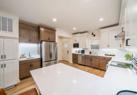Well Equipped Kitchen with Stainless Steel Appliances