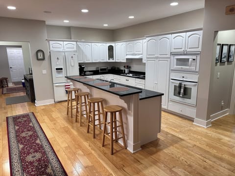 Kitchen and hallway. Our coffee maker can brew drip coffee and Keurig coffee.
