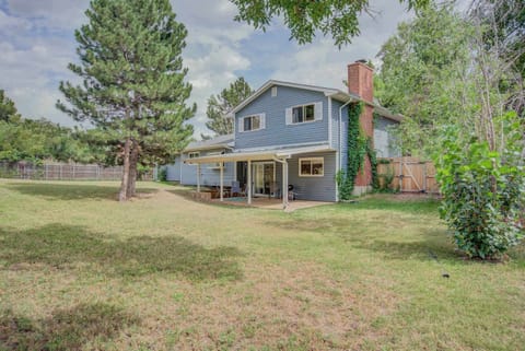 This spacious backyard features a covered patio, mature trees, and plenty of open space to relax and enjoy the outdoors. A perfect setting for gatherings or quiet moments in nature.





