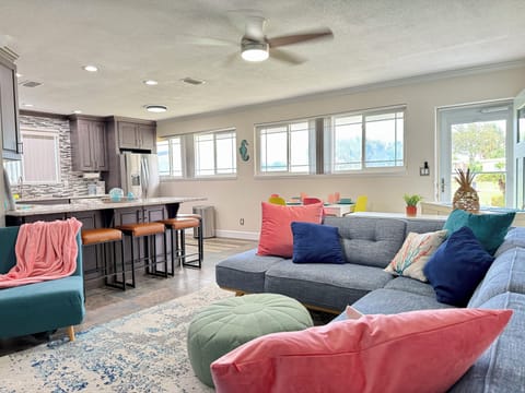 Living room: Natural tones and ocean-inspired decor create calm vibes. The perfect spot to recharge.