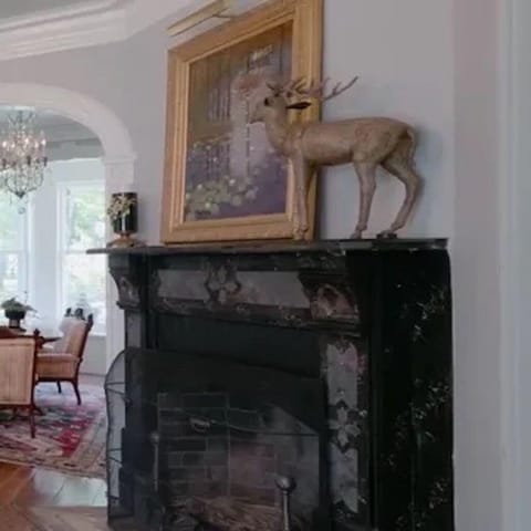 An original Victorian fireplace, one of the seven fireplaces on the property.  