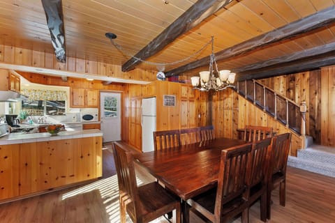Large dining room table with 8 chairs.