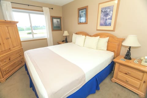 Wake up refreshed in a bright, inviting king bedroom.