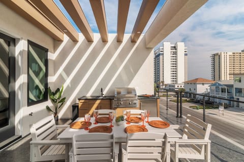 Balcony seating with summer kitchen for fresh ocean breezes