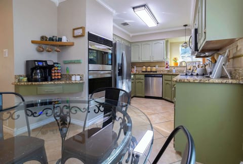 Sip morning coffee or grab a bite at the kitchen table, seating 6