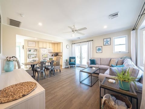 Bright and airy layout with a seamless flow between the kitchen and living areas.