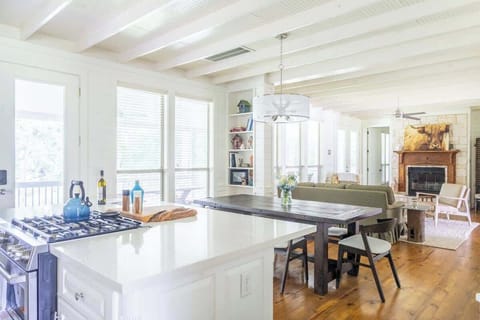 Open concept kitchen, dining, and living