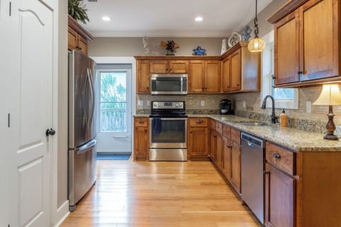 Kitchen - The spacious kitchen features all items needed for preparing your meals during your stay.
