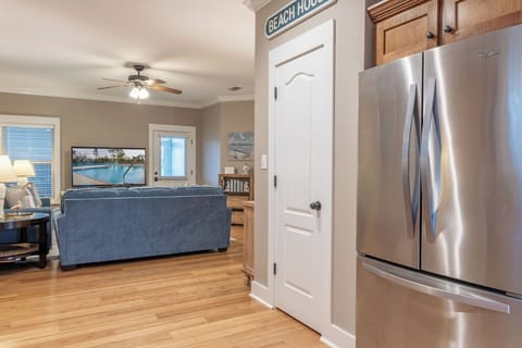 Kitchen - The fully stocked kitchen features stainless appliances and all items needed for heating, cooking and preparing meals during your stay.