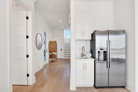 Full size fridge and wet bar on the 1st floor