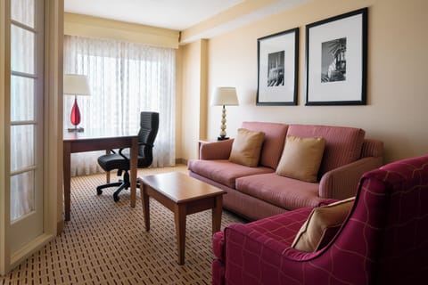 Settle in with a cozy sofa and bright work nook.