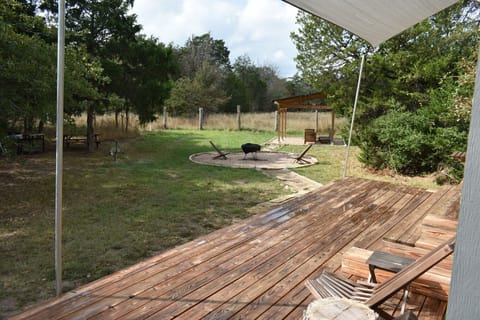Deck with a view of the fire pit