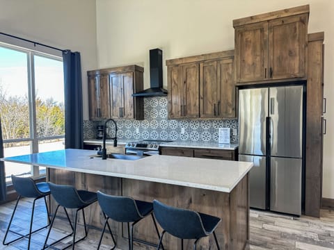 Enjoy the big farm style sink and dishwasher, giving you more relax time.