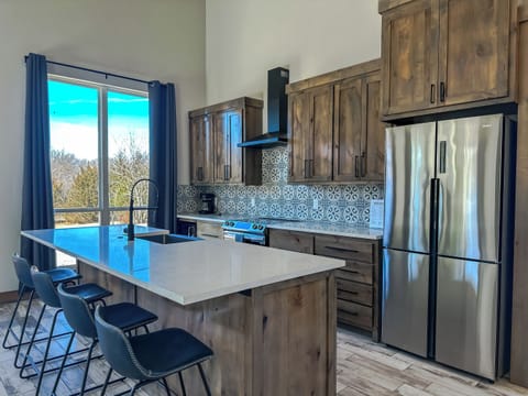 The spacious eat-in kitchen provides all the comforts of home.