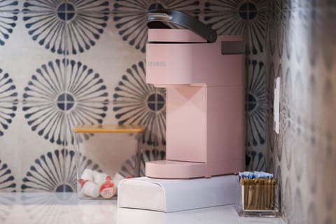 Wake up to the perfect cup with complimentary coffee and condiments, ensuring your mornings start as sweet and cozy as your stay.