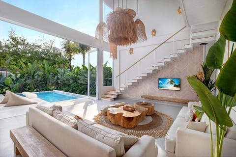 Lounge in this open-air living room, where Bali’s tropical breeze meets modern comfort! 🛋️