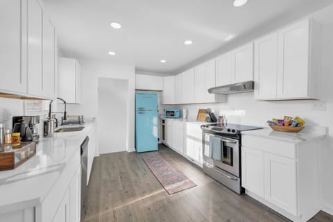 Spacious kitchen fully equipped for baking and cooking. Coffee and snack bar.