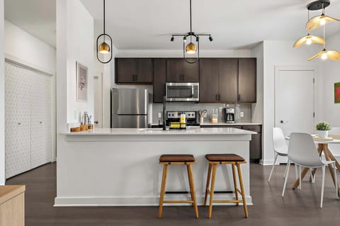 Enjoy the convenience of a fully equipped kitchen, complete with modern stainless steel appliances, ample counter space, and all the essentials needed to prepare meals with ease.