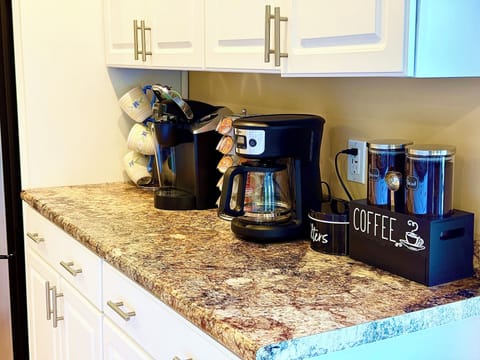 Full Kitchen with Breakfast Bar
A bright, fully stocked kitchen with a large coffee bar—ideal for cooking together, sharing laughs, and planning the day's adventures.