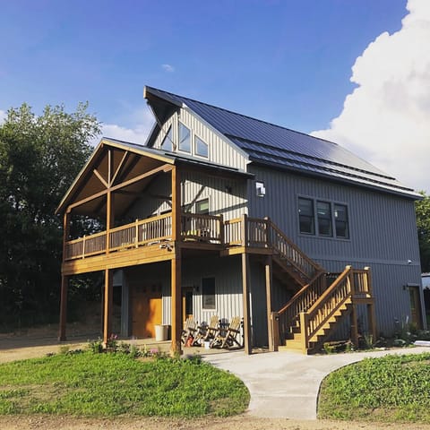 Envisage during the spring. External stairs to veranda shown.