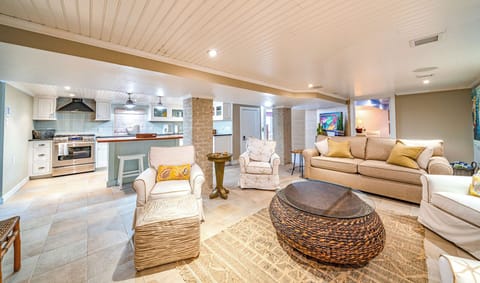 Living room area with lots of plush seating