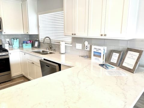 Large fully stocked kitchen with kitchen gadgets galore, kids supplies & more!